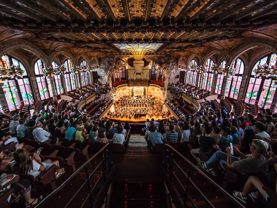 An orchestra performing at the Palau de la Musica in Barcelona Spain